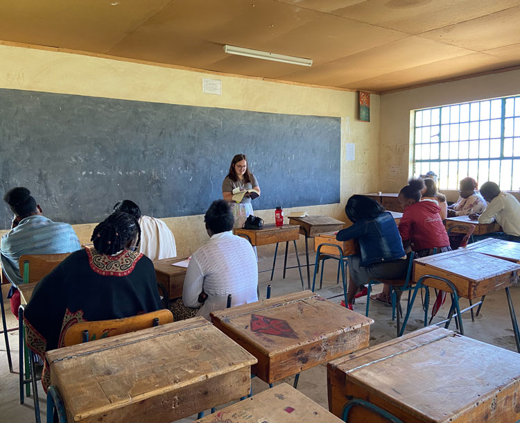 teacher in a classroom in a foreign country